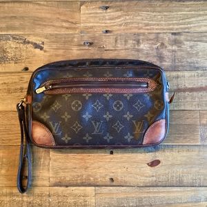 SOLD CONSIGNMENT. LV vintage Monogram wristlet.